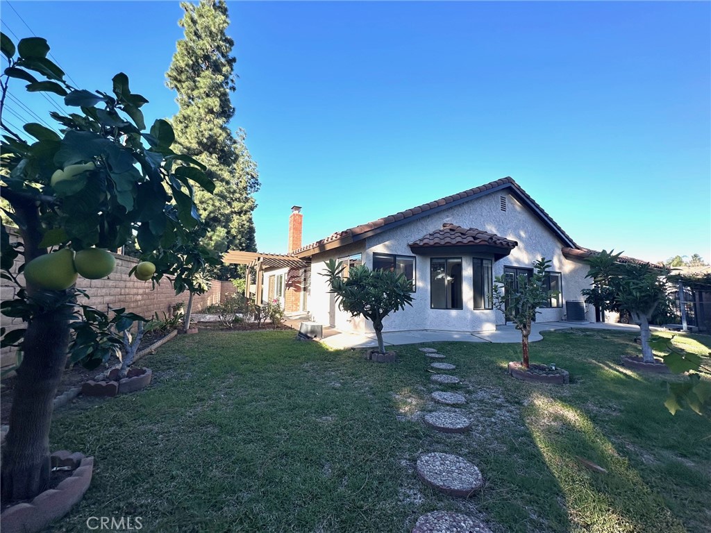 183 South Starflower Street Brea, CA 92821 - Photo 33 of 42 a front view of a house with garden