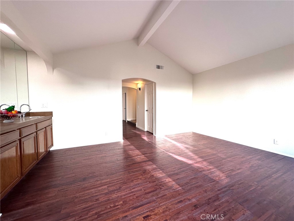 183 South Starflower Street Brea, CA 92821 - Photo 9 of 42 a view of an empty room and wooden floor