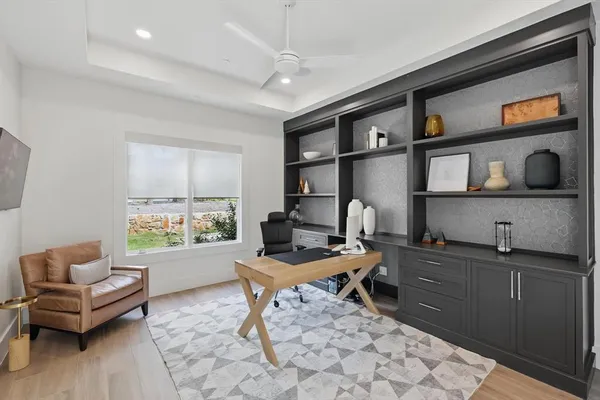 a workspace with furniture and window