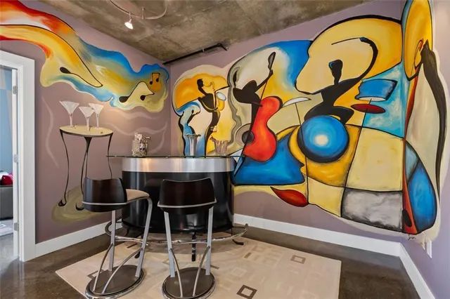 a bedroom with a bed and a tv