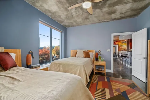 a view of hallway with wooden floor