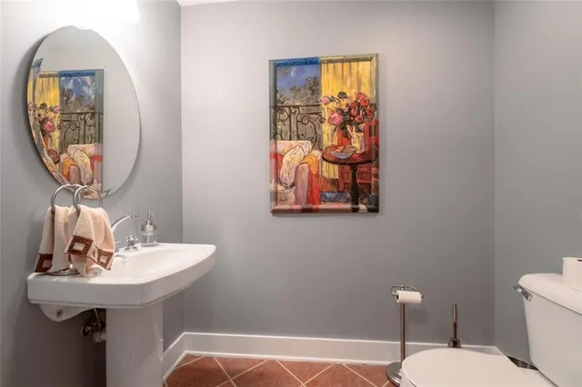 a bedroom with bed and window