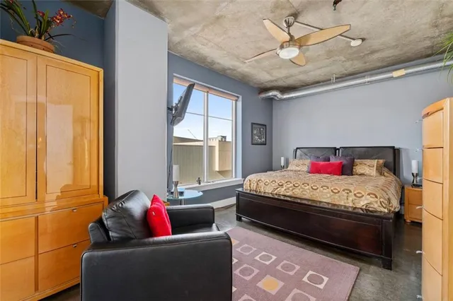 a bed room with a bed and a walk in closet