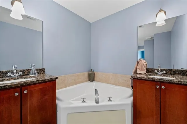 a view of a dining room with furniture and window