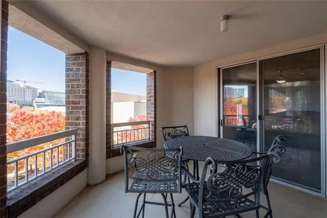 a view of a room with a large window