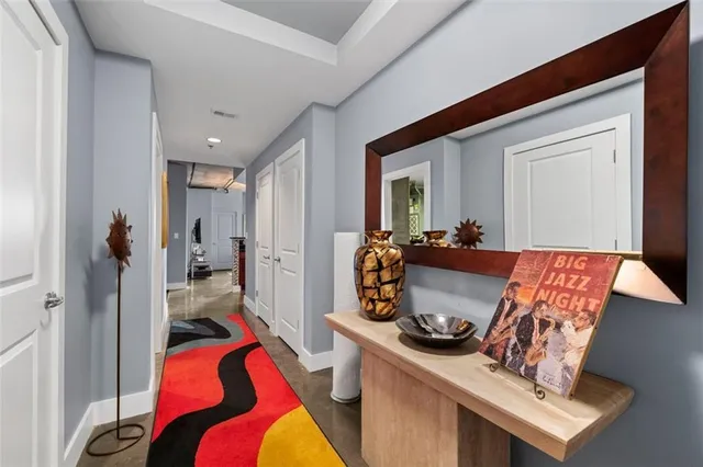 a living room with a bed and furniture