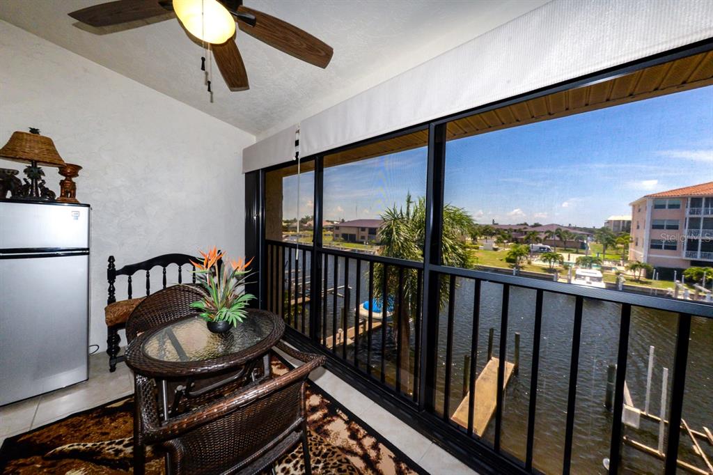 335 Coldeway Drive, Unit F21 Punta Gorda, FL 33950 - Photo 16 of 45 a balcony with chairs