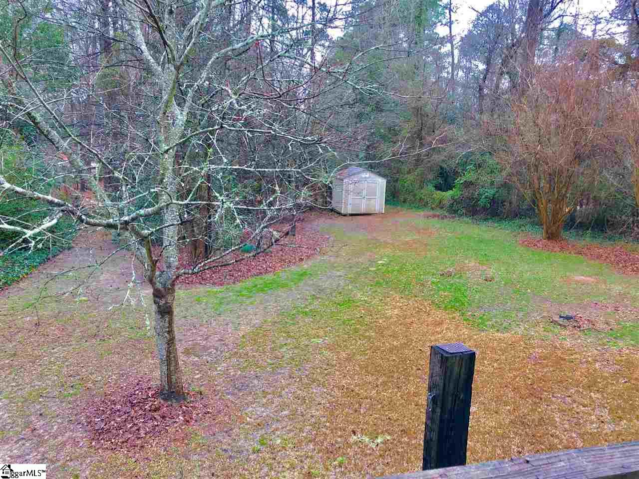 602 Cedar Street Clinton, SC 29325 - Photo 11 of 11 Large back yard with outside storage
