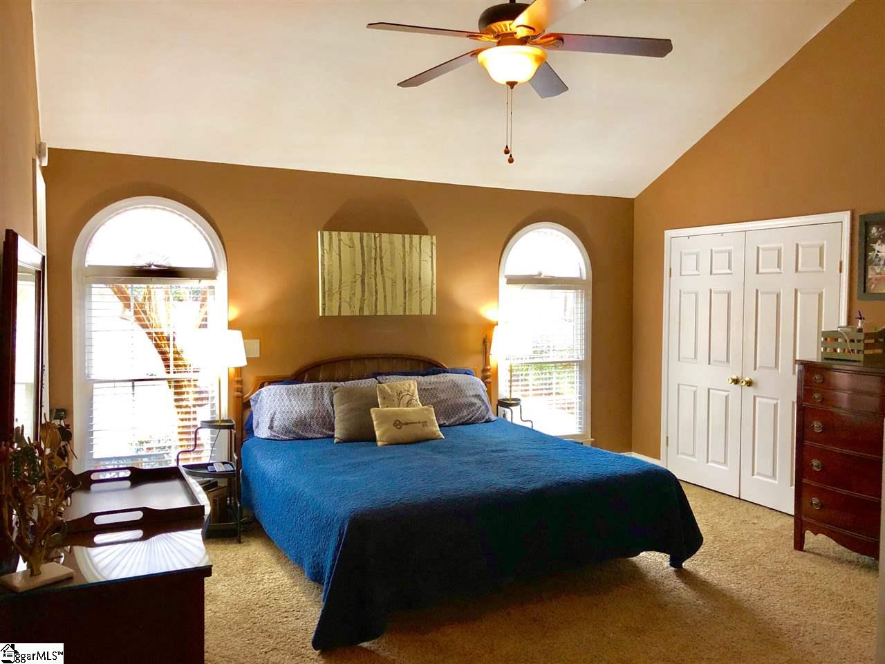 Master Bathroom with vaulted ceilings and double closets.