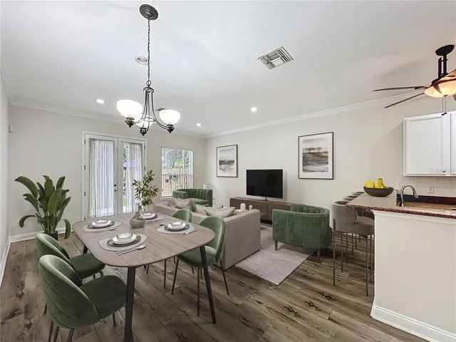 a view of a dining room with furniture