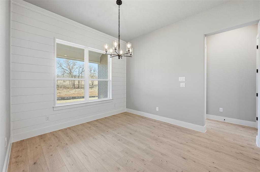 1053 Llano Way Poolville, TX 76487 - Photo 14 of 40 a view of an empty room with a window