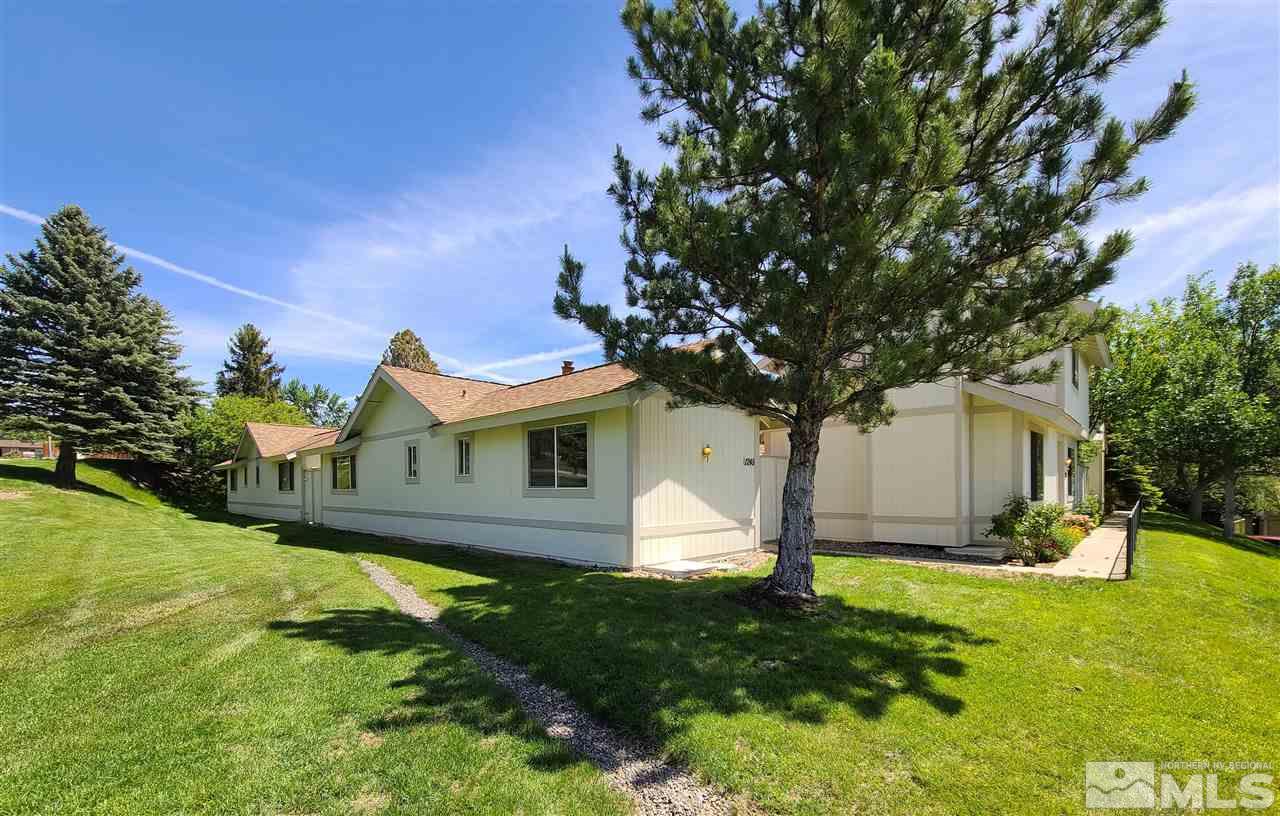1245 Searchlite Court Reno, NV 89503 - Photo 1 of 26 a front view of house with yard and green space