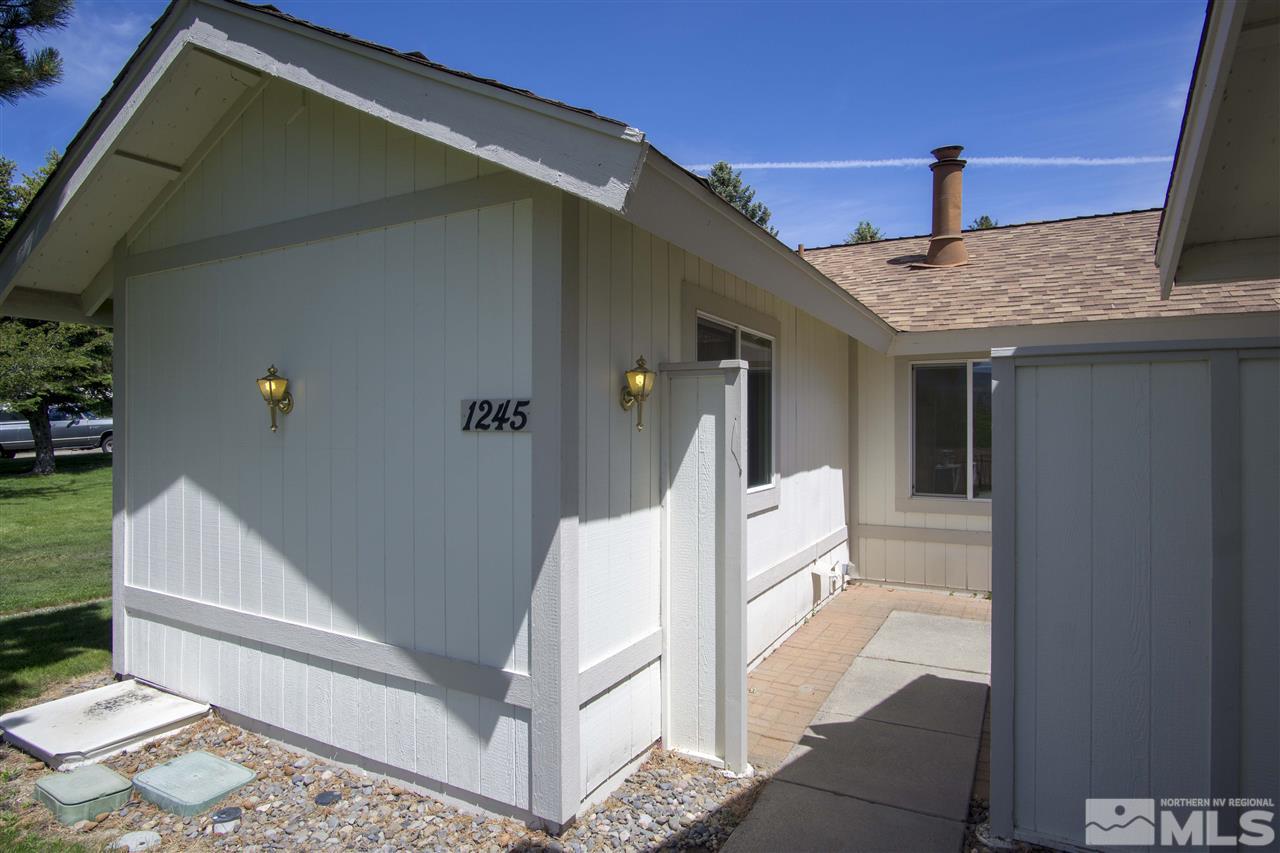 1245 Searchlite Court Reno, NV 89503 - Photo 2 of 26 a house view with a backyard