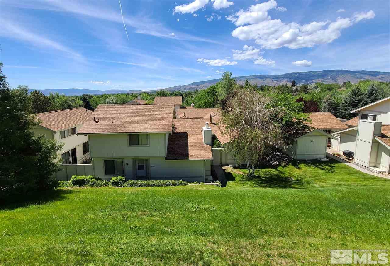 1245 Searchlite Court Reno, NV 89503 - Photo 25 of 26 a front view of a house with a yard
