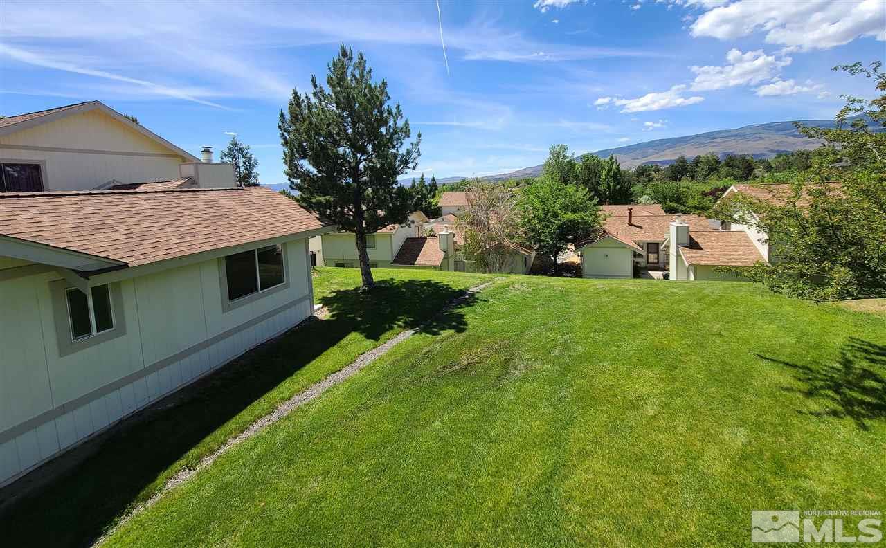 1245 Searchlite Court Reno, NV 89503 - Photo 3 of 26 a view of a house with a yard and sitting area