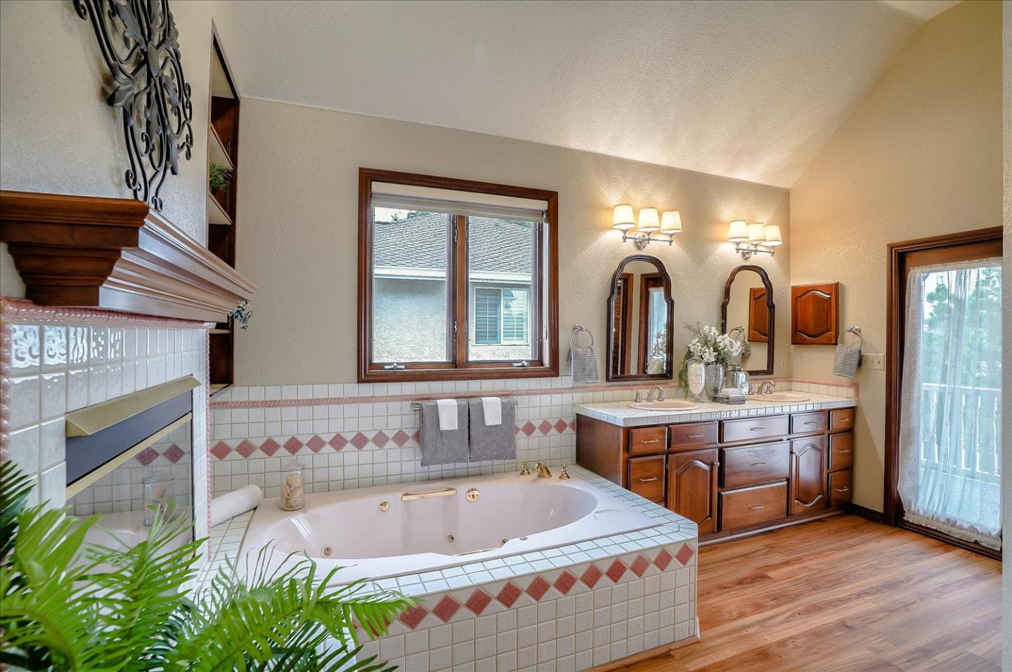 669 Regas Drive Campbell, CA 95008 - Photo 28 of 59 a spacious bathroom with a tub double sink and a large mirror