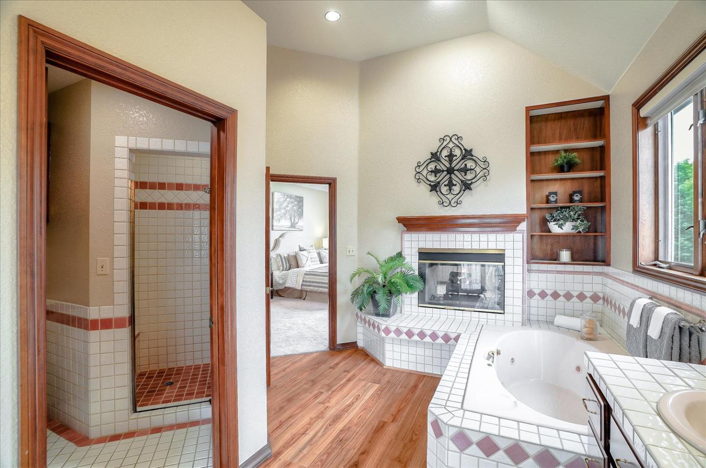 669 Regas Drive Campbell, CA 95008 - Photo 29 of 59 a living room with furniture a fireplace and a table