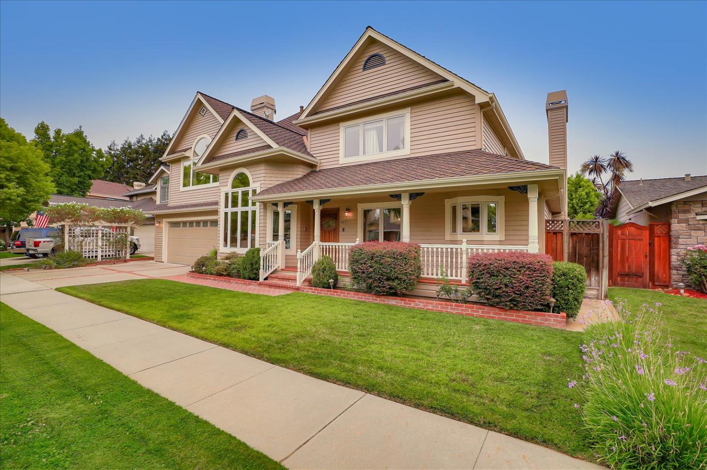 669 Regas Drive Campbell, CA 95008 - Photo 3 of 59 a front view of a house with a yard and porch