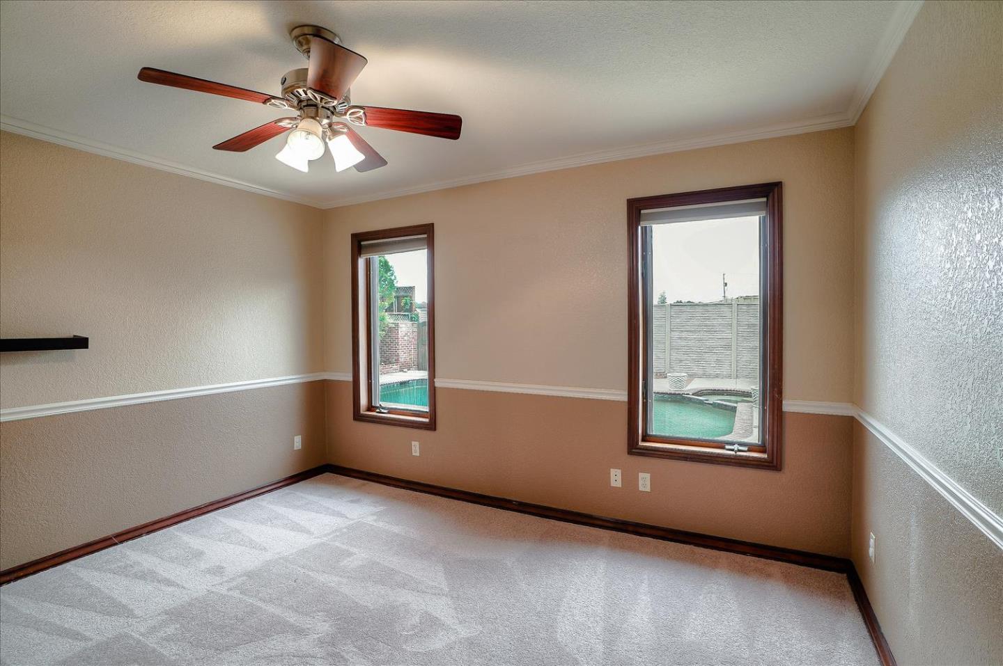 669 Regas Drive Campbell, CA 95008 - Photo 37 of 59 an empty room with windows and fan