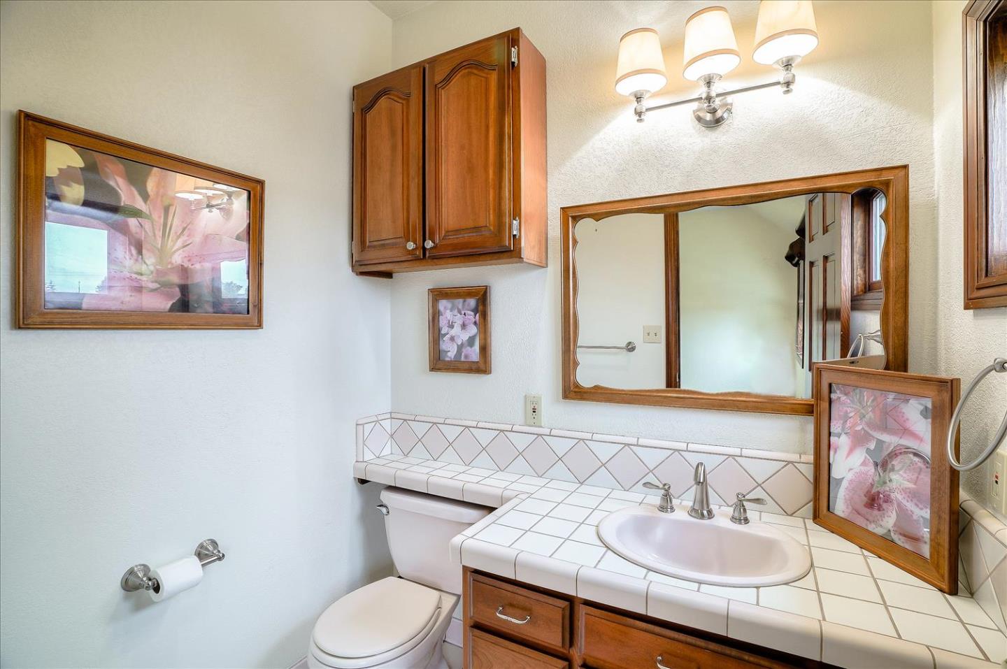 669 Regas Drive Campbell, CA 95008 - Photo 46 of 59 a bathroom with a toilet sink and mirror