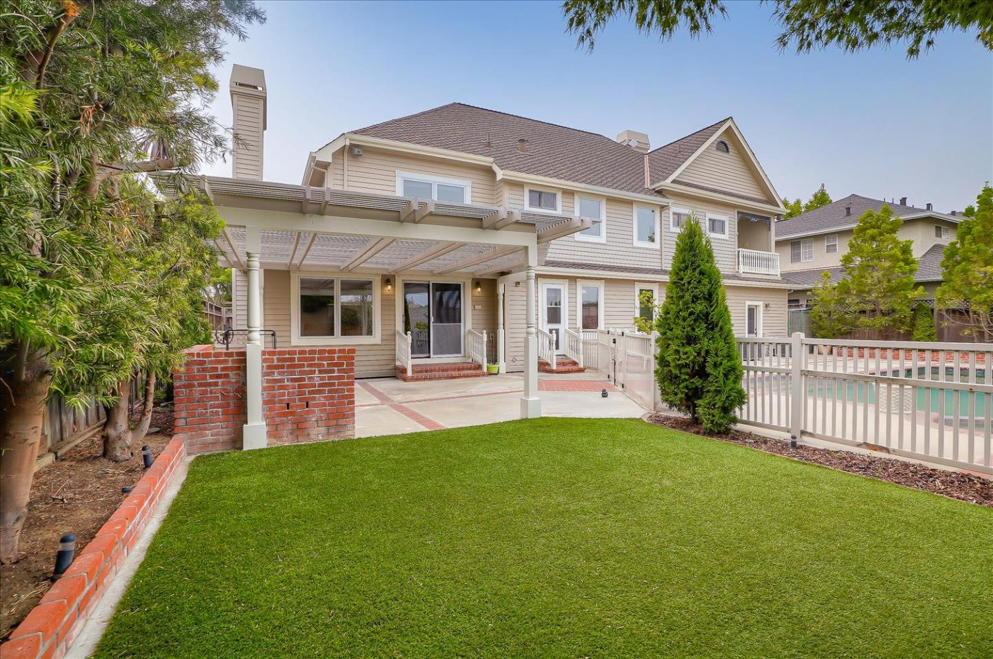 669 Regas Drive Campbell, CA 95008 - Photo 55 of 59 a front view of a house with a yard table and chairs