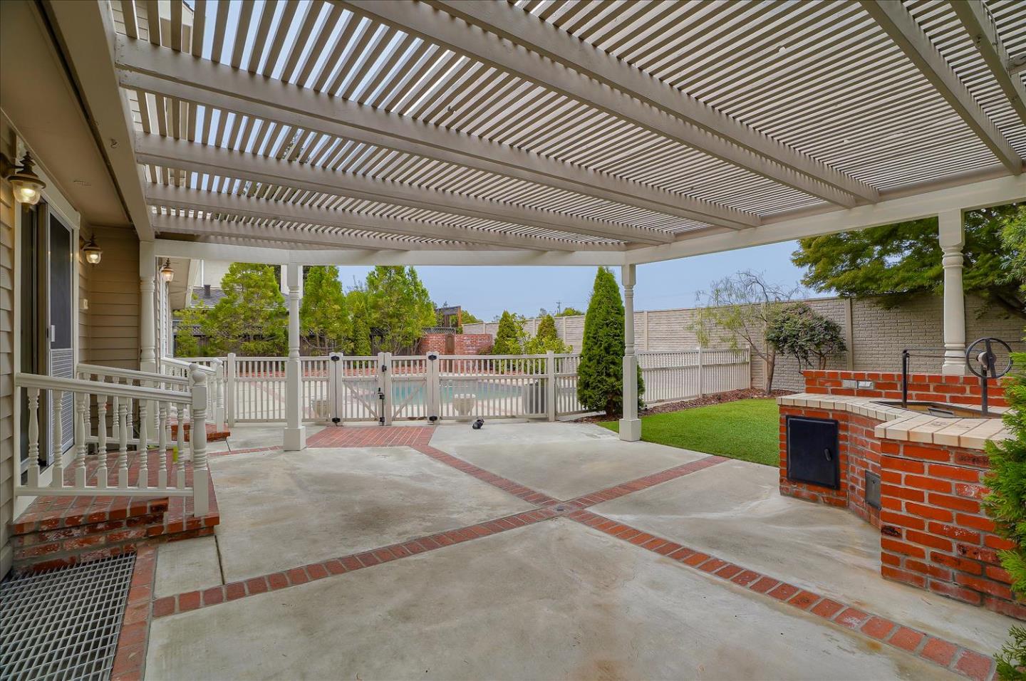 669 Regas Drive Campbell, CA 95008 - Photo 56 of 59 a view of a patio with a table chairs and a patio