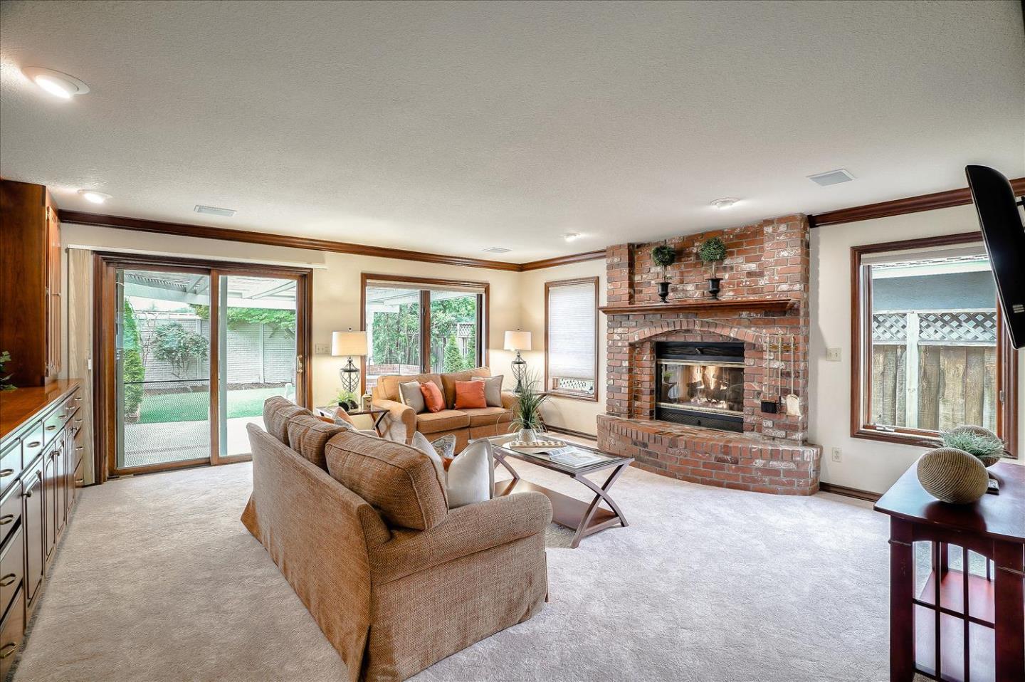 669 Regas Drive Campbell, CA 95008 - Photo 9 of 59 a living room with furniture and a fireplace