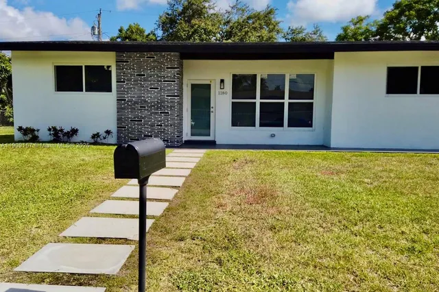 a view of pool with seating space