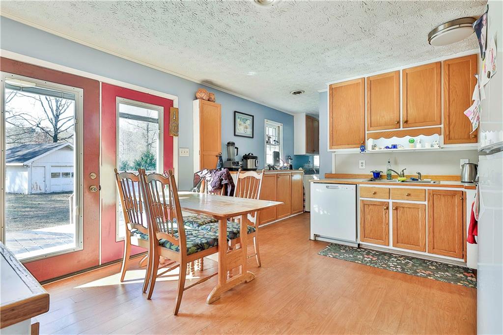 8420 Cleckler Road Palmetto, GA 30268 - Photo 14 of 51 a view of a dining room with furniture window and outside view