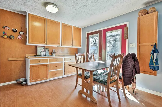 a kitchen with sink a refrigerator and washer