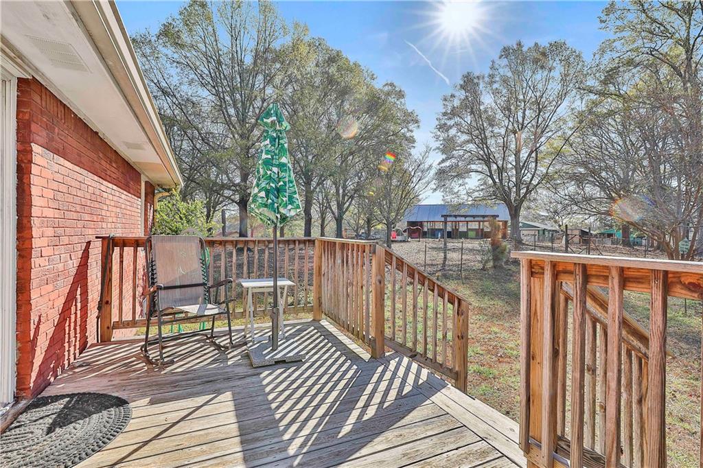 8420 Cleckler Road Palmetto, GA 30268 - Photo 22 of 51 a view of a balcony with chairs