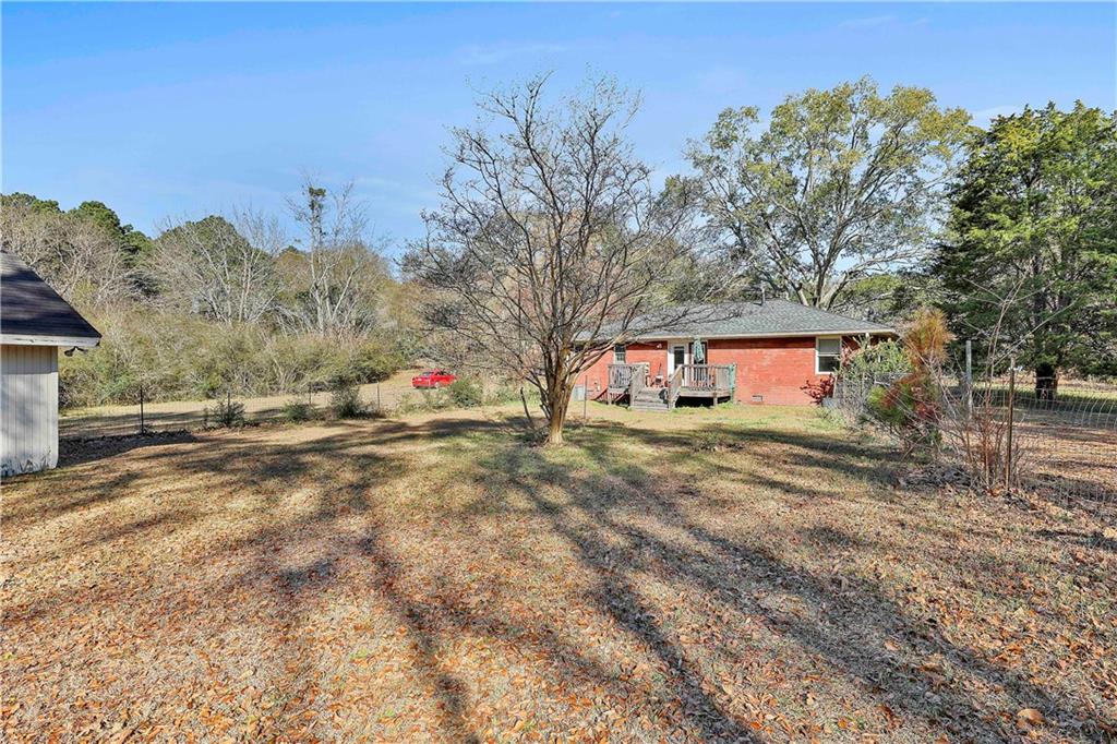 8420 Cleckler Road Palmetto, GA 30268 - Photo 26 of 51 a view of road with large trees