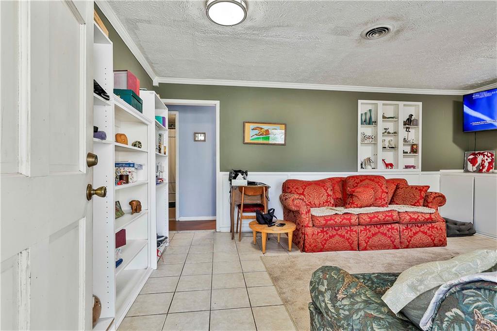 8420 Cleckler Road Palmetto, GA 30268 - Photo 10 of 51 a bedroom with furniture and a bathtub