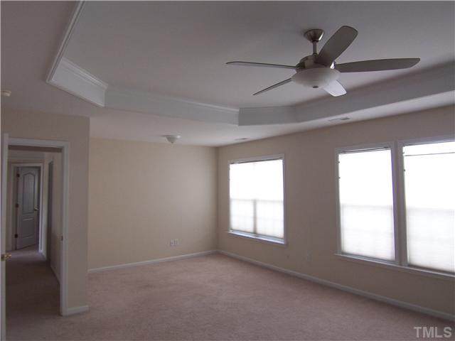 7605 Derek Drive Raleigh, NC 27613 - Photo 13 of 18 an empty room with a window