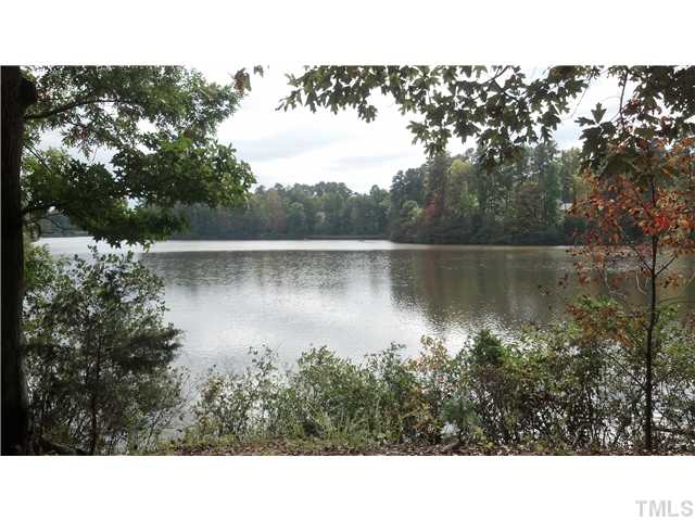 7605 Derek Drive Raleigh, NC 27613 - Photo 17 of 18 a black and white photo of a lake
