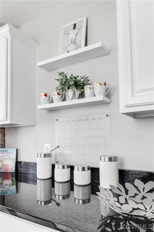 4301 Norborne Road Richmond, VA 23234 - Photo 11 of 29 a kitchen with a stove and cabinets