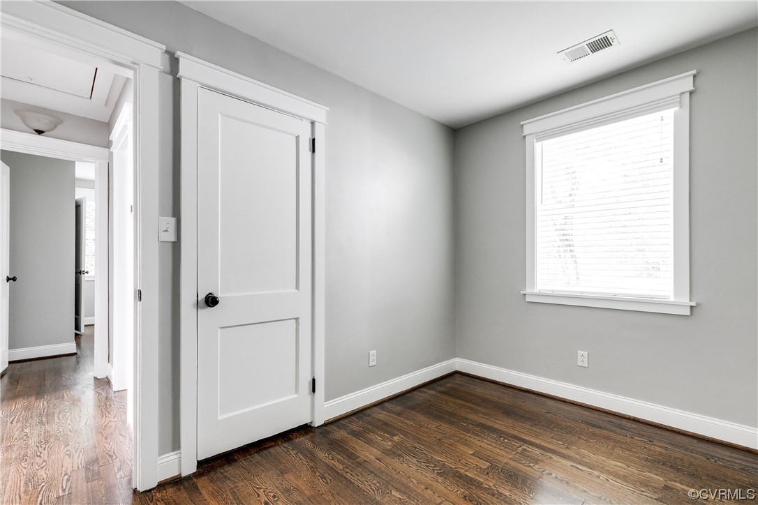 4301 Norborne Road Richmond, VA 23234 - Photo 18 of 29 a view of an empty room with wooden floor and a window