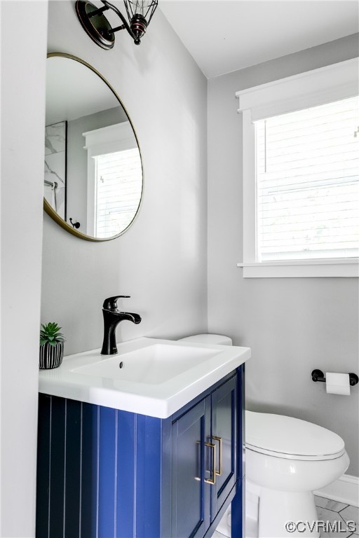 4301 Norborne Road Richmond, VA 23234 - Photo 20 of 29 a bathroom with a sink a toilet and a mirror