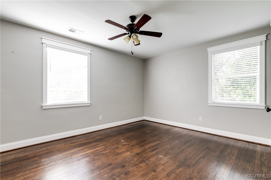 4301 Norborne Road Richmond, VA 23234 - Photo 24 of 29 a view of empty room with wooden floor and fan