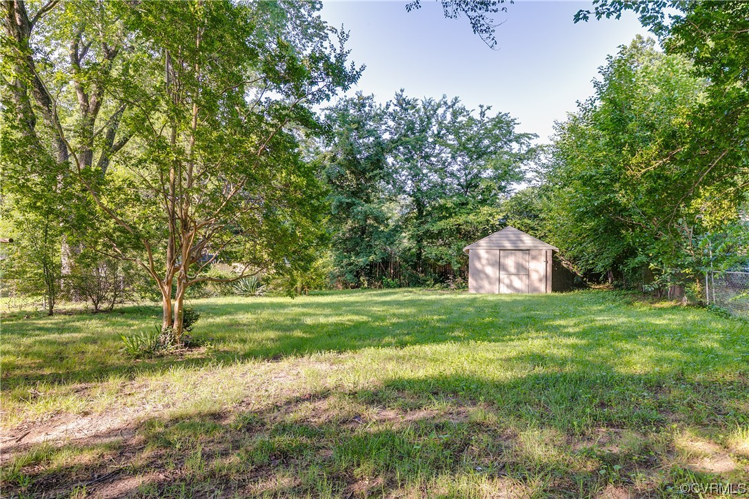 4301 Norborne Road Richmond, VA 23234 - Photo 28 of 29 a big yard with lots of green space and trees