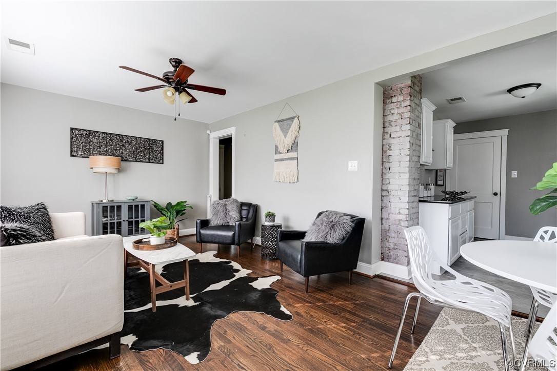 4301 Norborne Road Richmond, VA 23234 - Photo 3 of 29 a living room with furniture and a view of kitchen