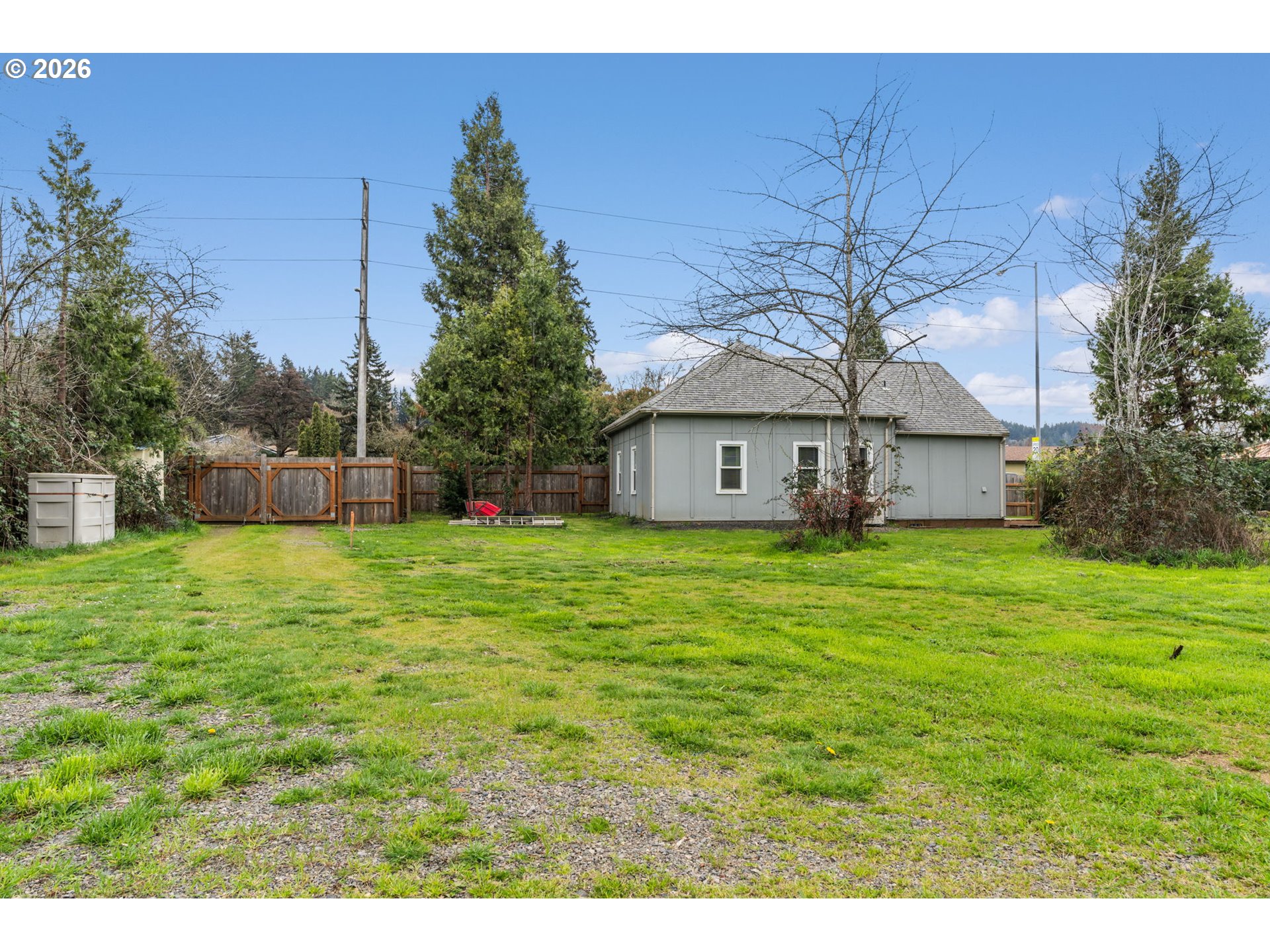 West 18th Avenue Eugene, OR 97402 - Photo 7 of 9 a front view of a house with garden