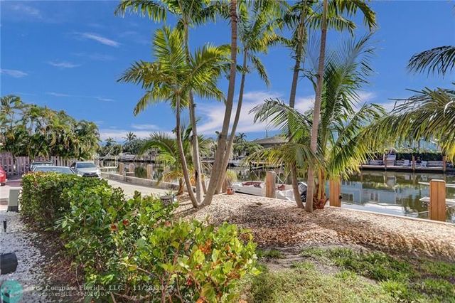 a view of a backyard of a house