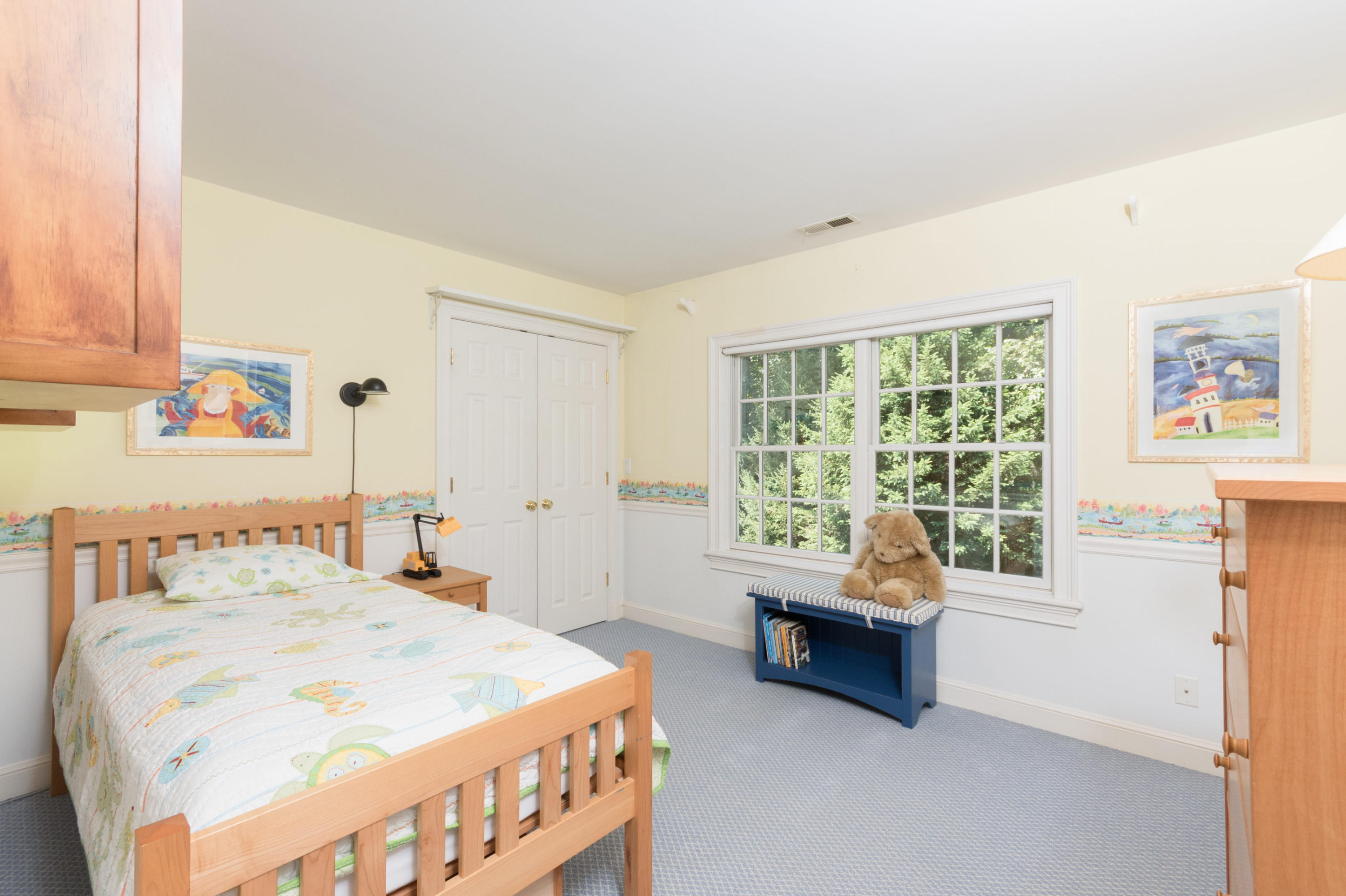 16 Circle Road Darien, CT 06820 - Photo 34 of 49 a bedroom with a bed and a window
