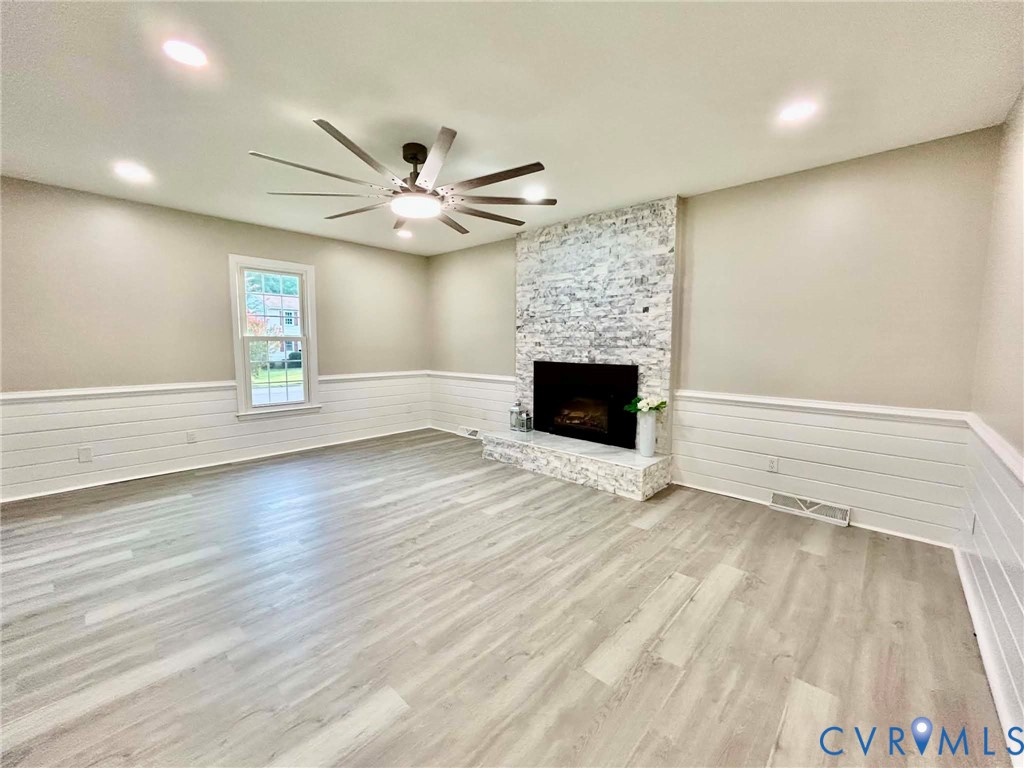 7110 Manning Road Chesterfield, VA 23832 - Photo 11 of 50 Wood-finish flooring, white shiplap wainscoting, a