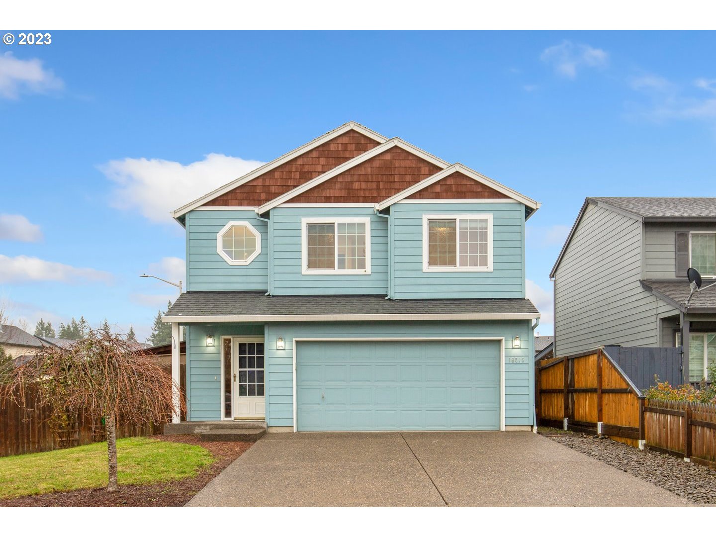 16519 Northeast 12th Avenue Ridgefield, WA 98642 - Photo 1 of 44 a front view of a house with a yard