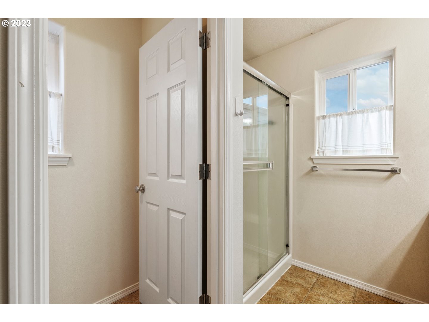 16519 Northeast 12th Avenue Ridgefield, WA 98642 - Photo 22 of 44 a view of a bathroom with closet and a window