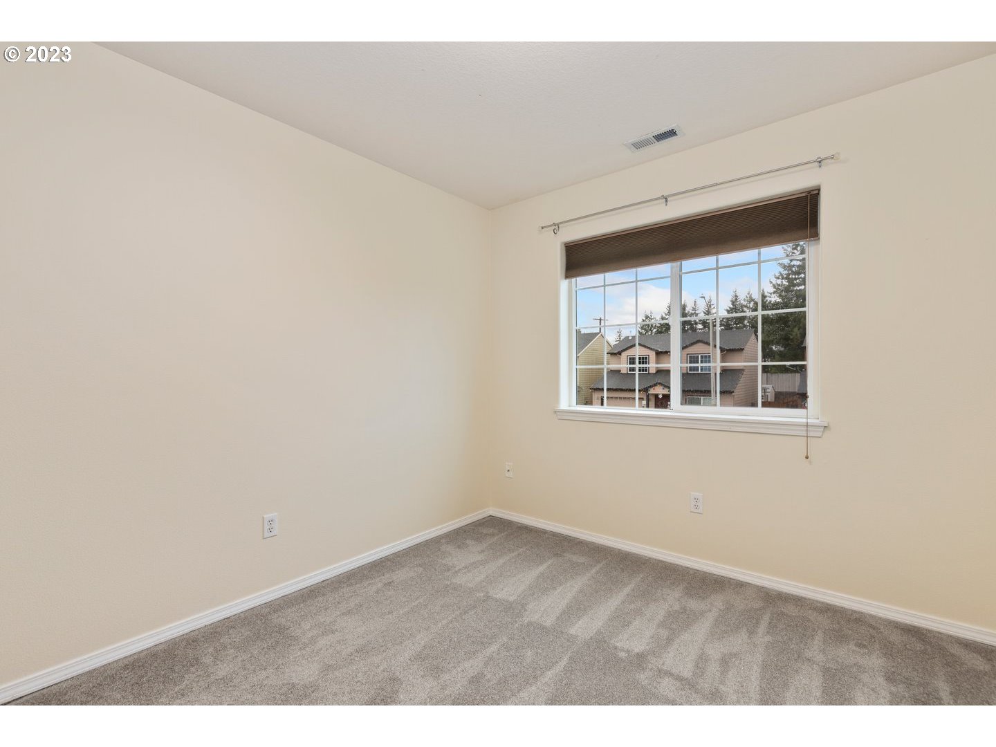 16519 Northeast 12th Avenue Ridgefield, WA 98642 - Photo 32 of 44 an empty room with wooden floor and windows