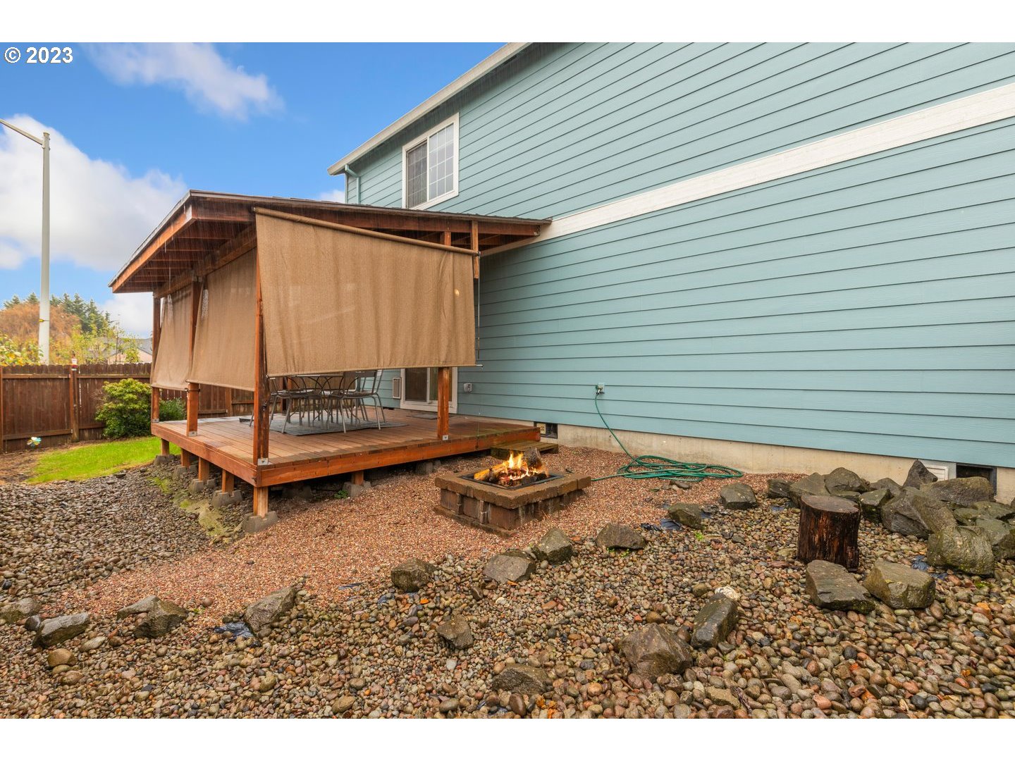 16519 Northeast 12th Avenue Ridgefield, WA 98642 - Photo 42 of 44 a backyard of a house with barbeque oven