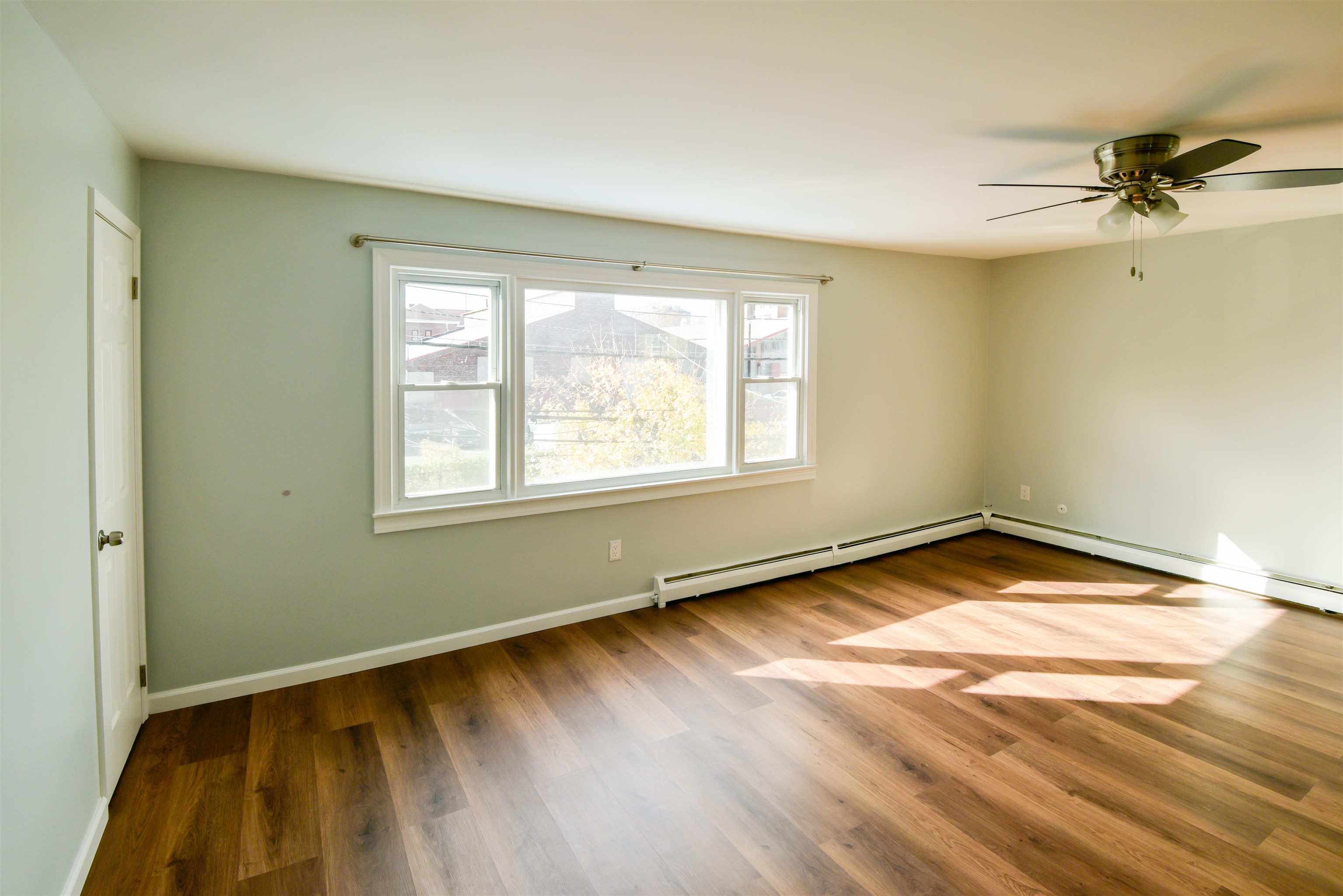 45 East 51st Street Bayonne, NJ 07002 - Photo 12 of 26 a view of an empty room and window